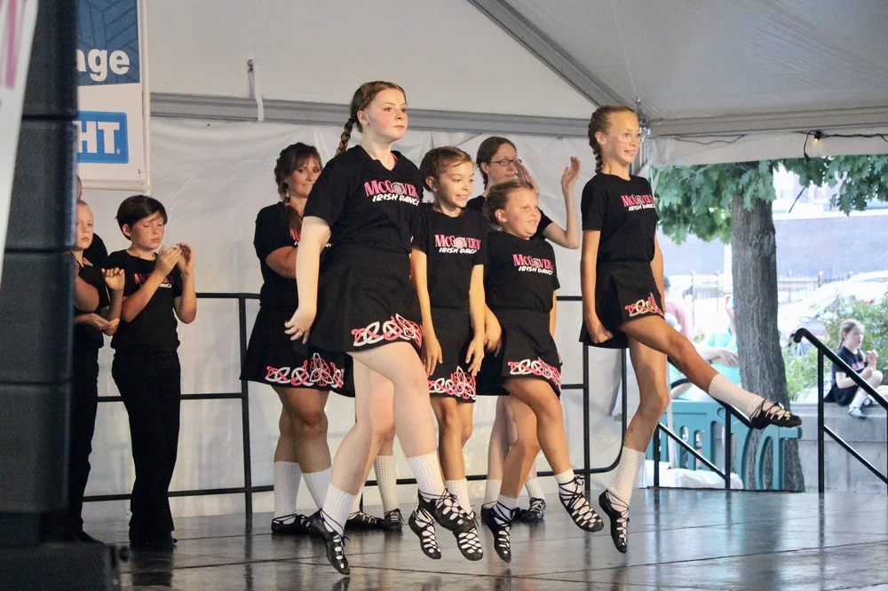 Irish dancers performing on stage