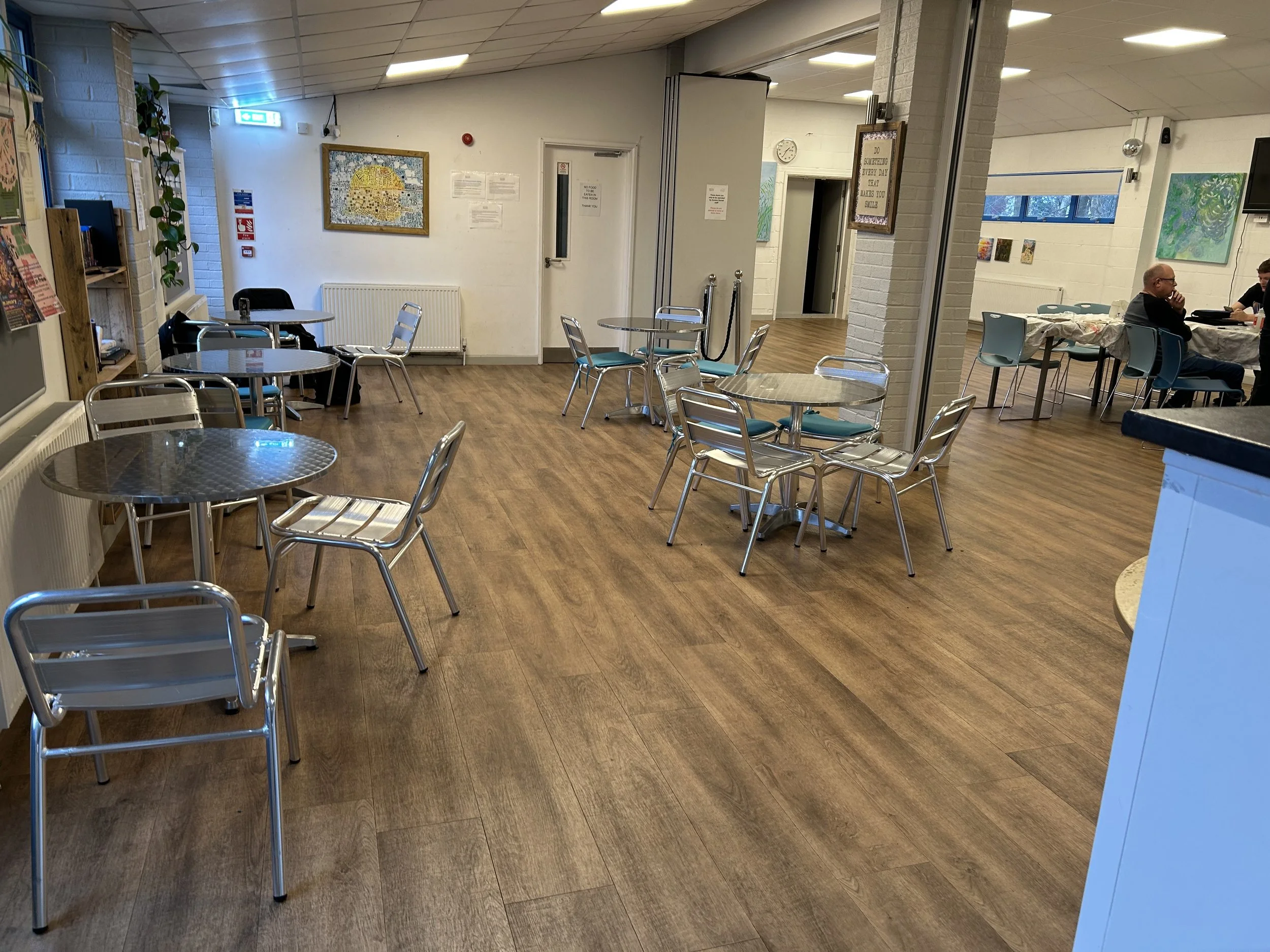 A photo showing the seating area at the cafe at The Bridge
