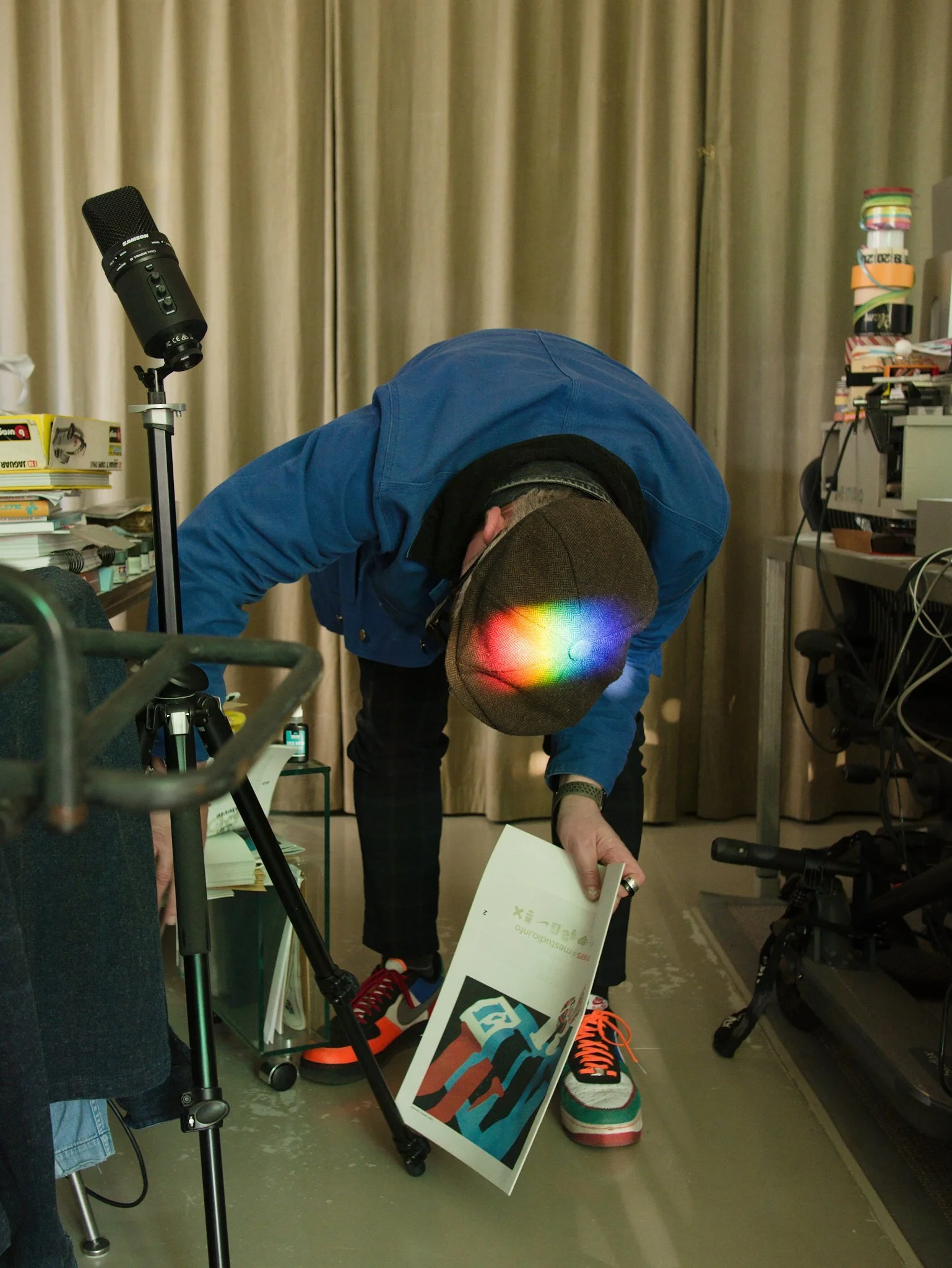Designer Martin Pyper searching for something in his studio in Amsterdam.