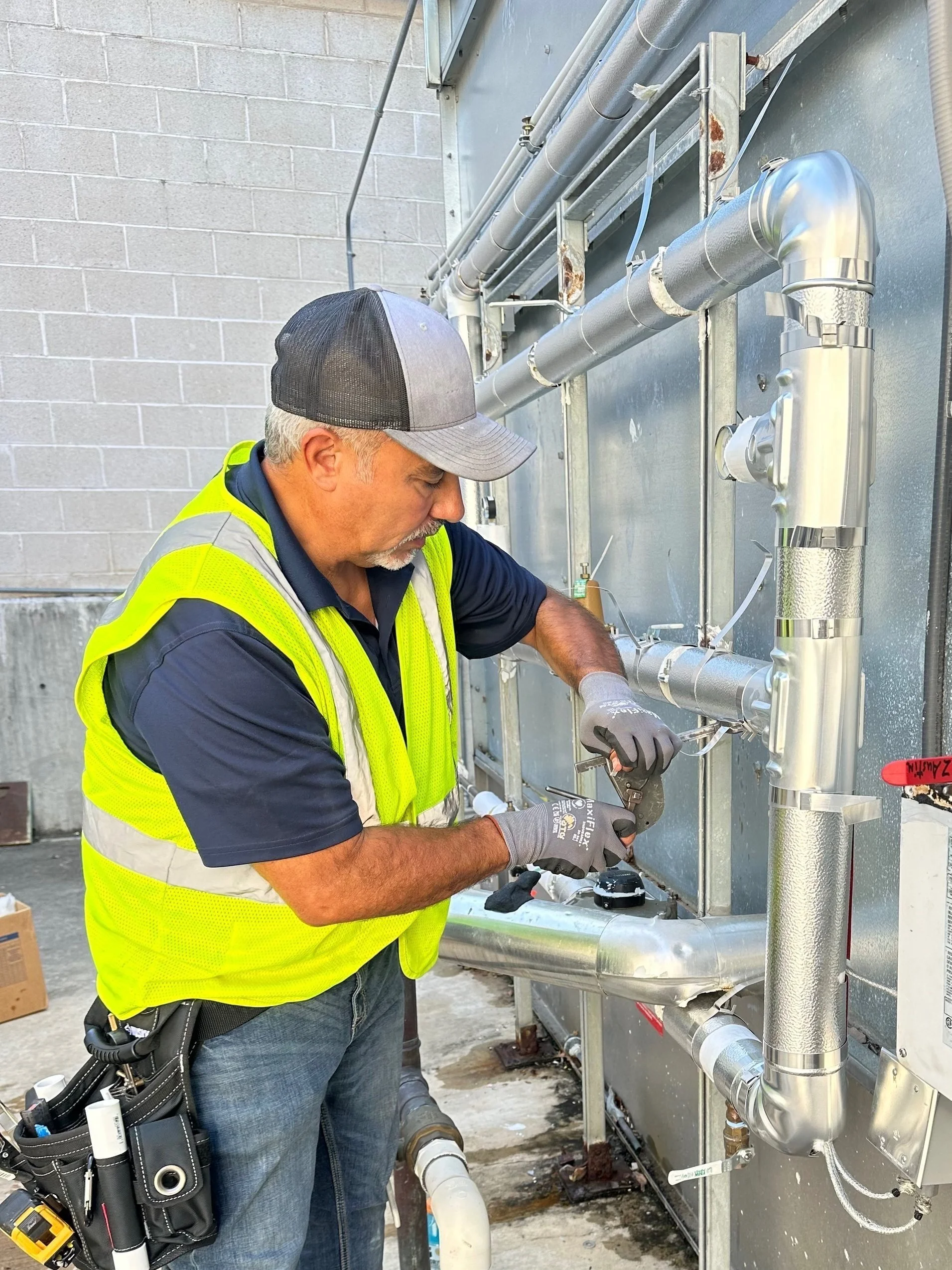 Ernest Cortez working on some pipe