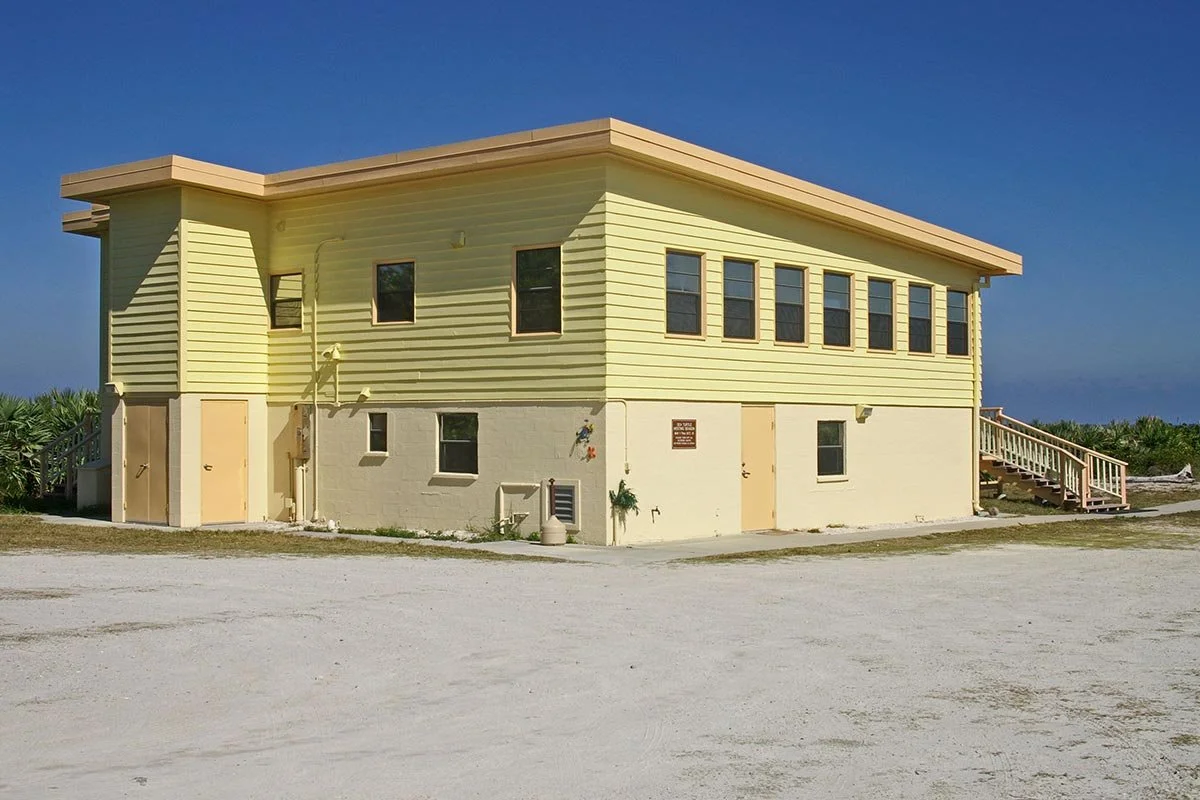 A sunny yellow beach house in Florida.