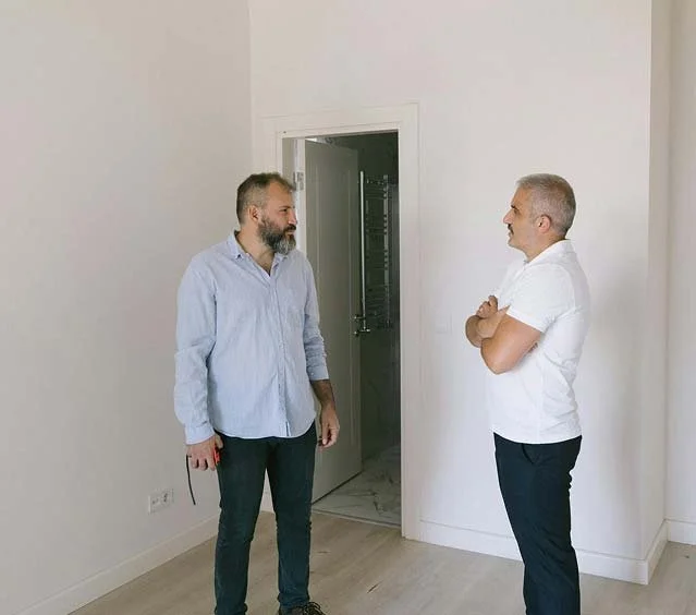 Investor discussing a property with a homeowner