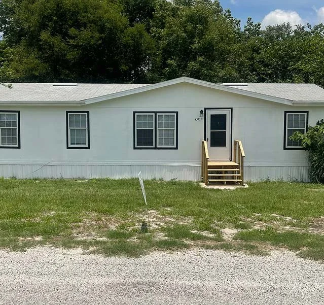 White mobile home in Polk County