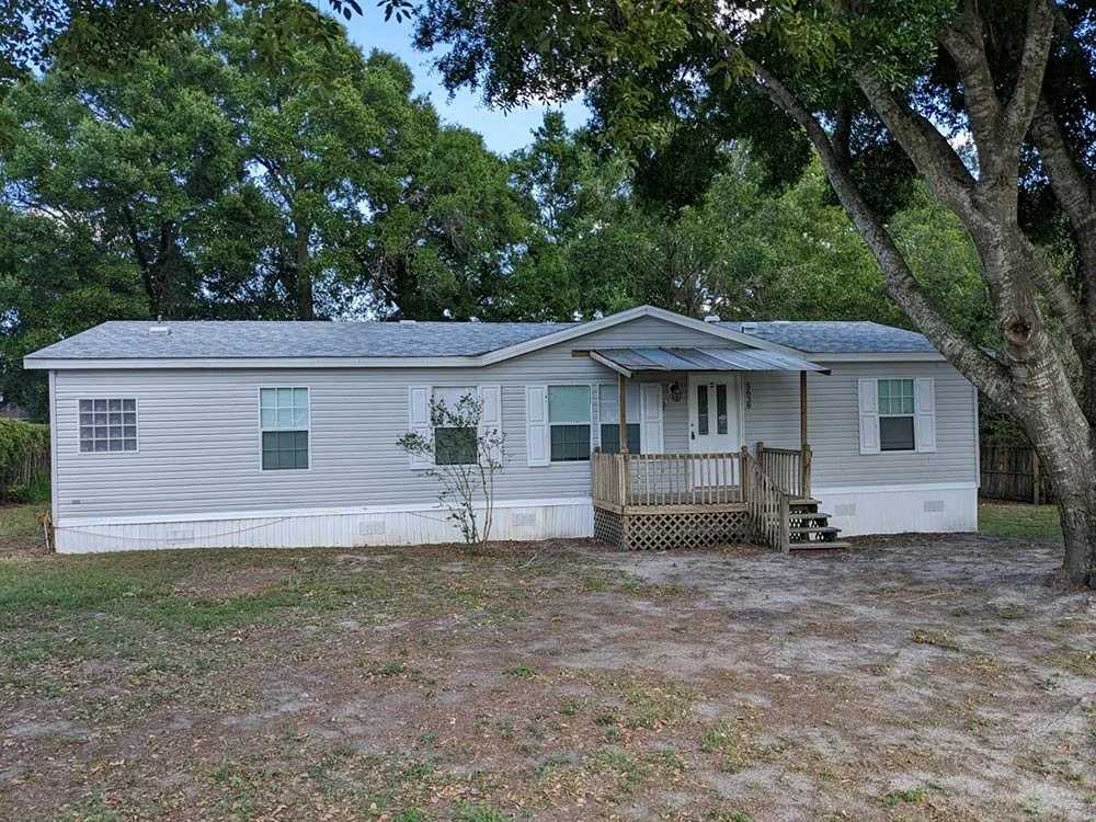 Mobile home with porch on Cherry Tree Drive