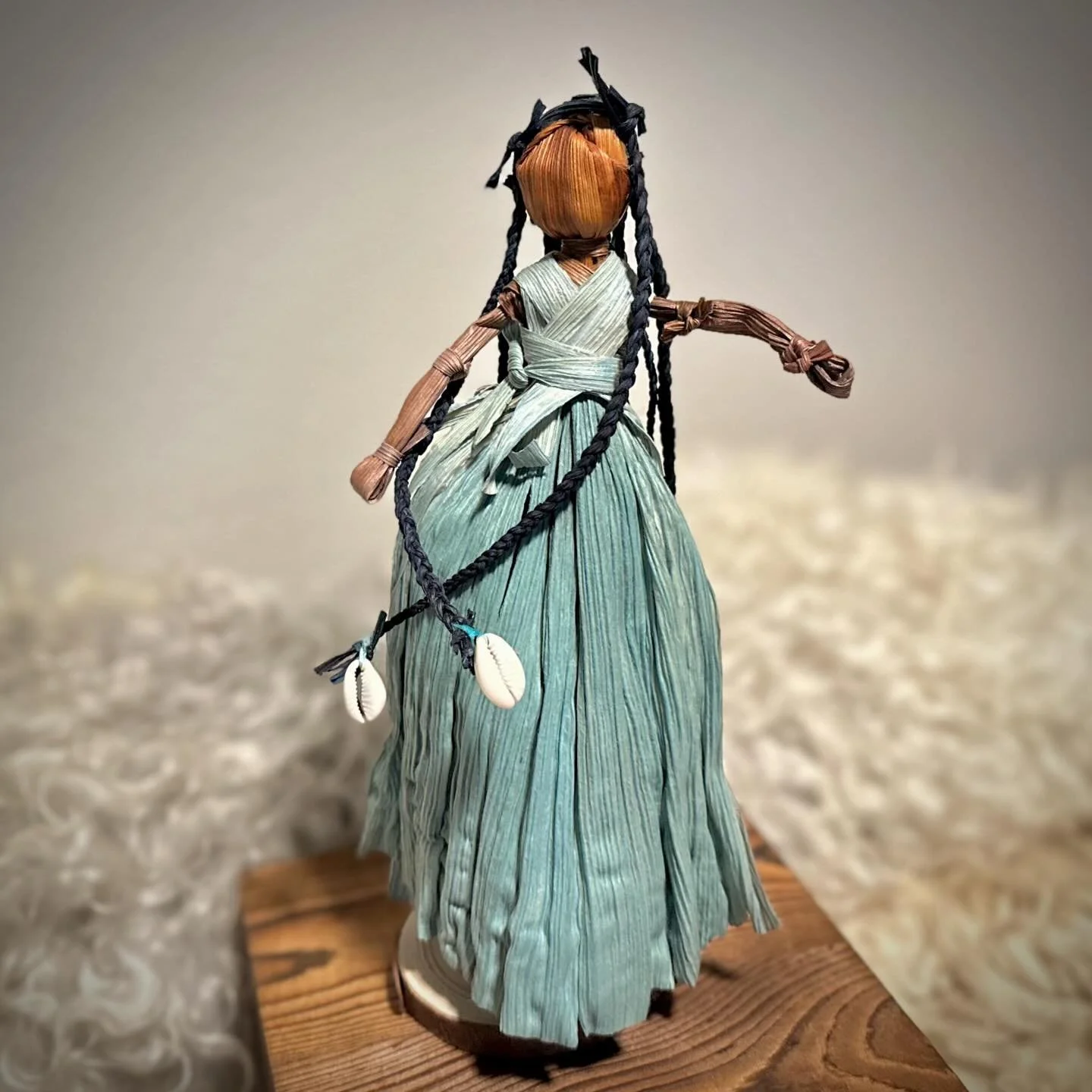 Sabrina - Indigo Ancestor Doll

Sabrina is dancing in celebration of the beauty of life! Her long indigo braids swing as she moves and the cowrie shells make a vibrant clacking sound. Sabrina reminds us that life is full of childlike wonder and that 