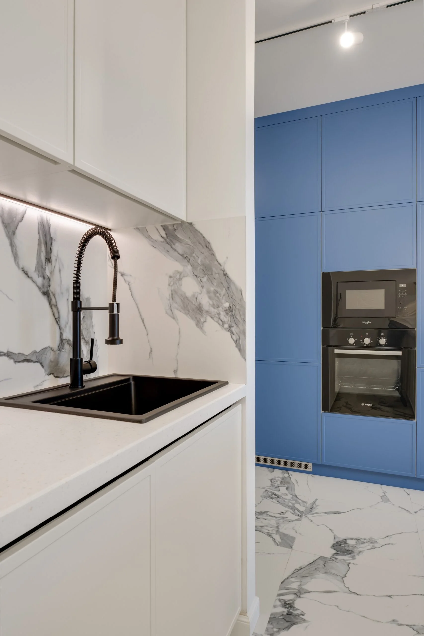 Kitchen cabinetry with touch to open doors and drawers.