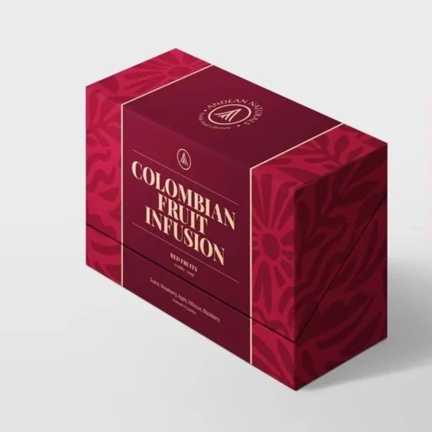 Red box with floral patterns labeled "Colombian Fruit Infusion" tea.