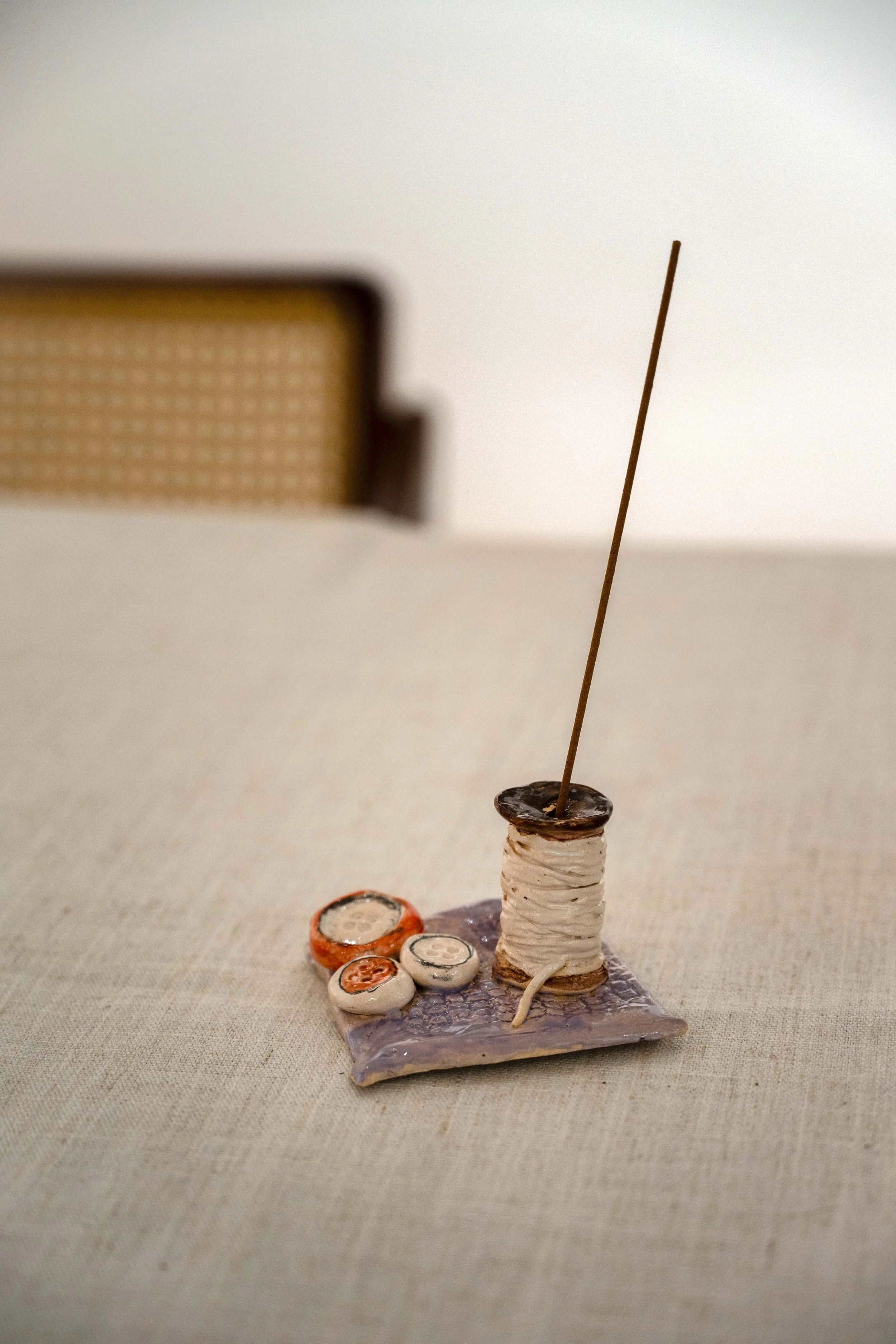 Button & Thread Incense Stand by Sascha Mallon
