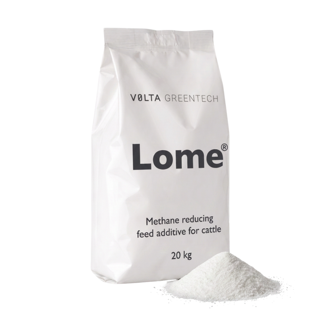 White bag labeled 'Lome' containing methane reducing feed additive for cattle, with some powder spilled in front.