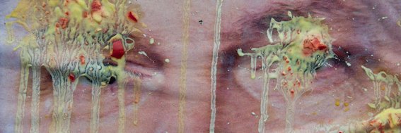 A photo of the eyes of a politician from their vandalized election campaign poster