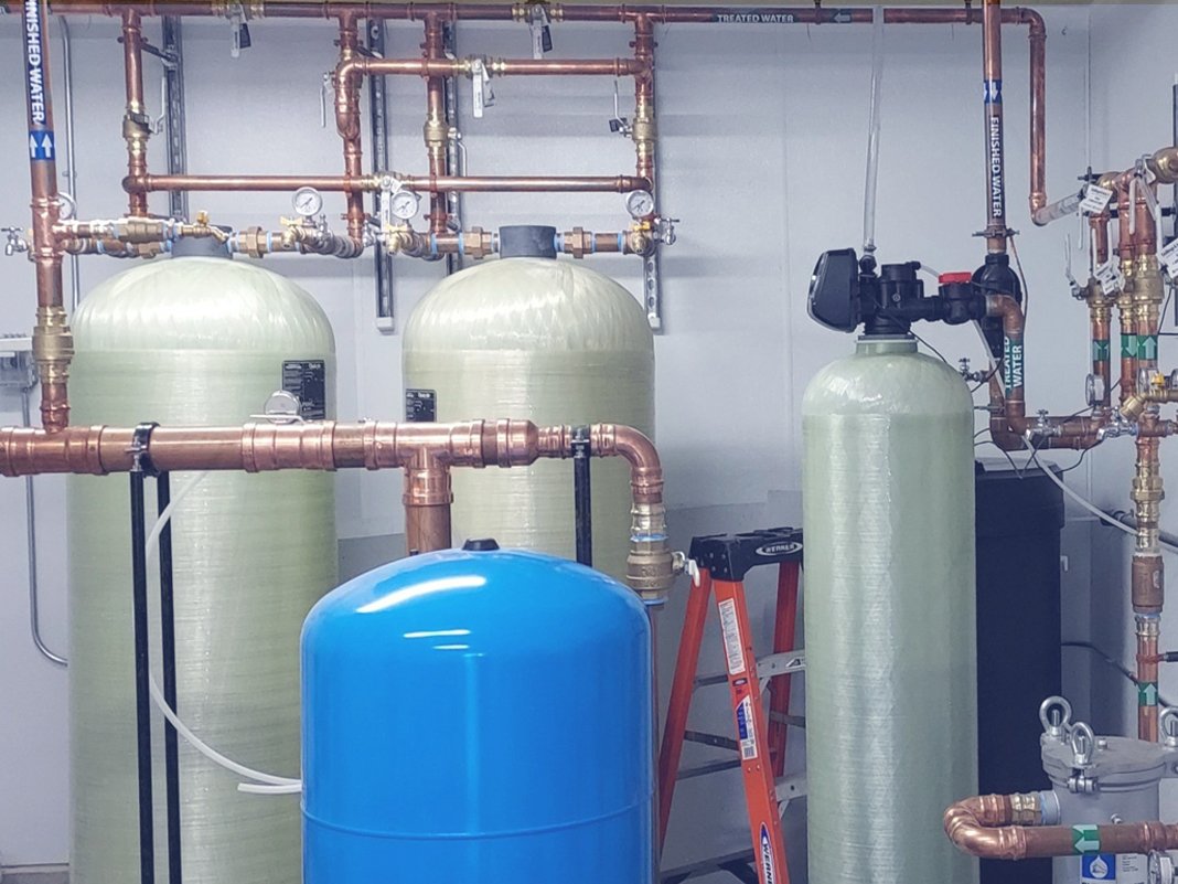 Several water tanks and water heaters in a business in Arlington Heights, IL