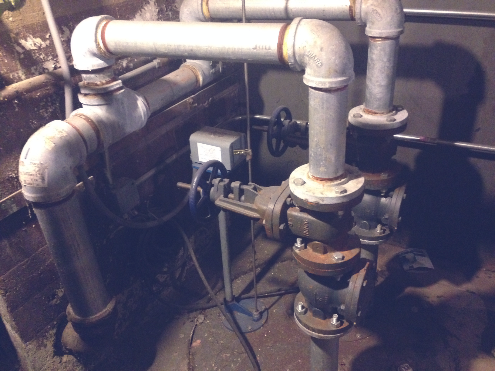 A sump pump and flood protection system in the basement of a business in Chicago's northwest suburbs