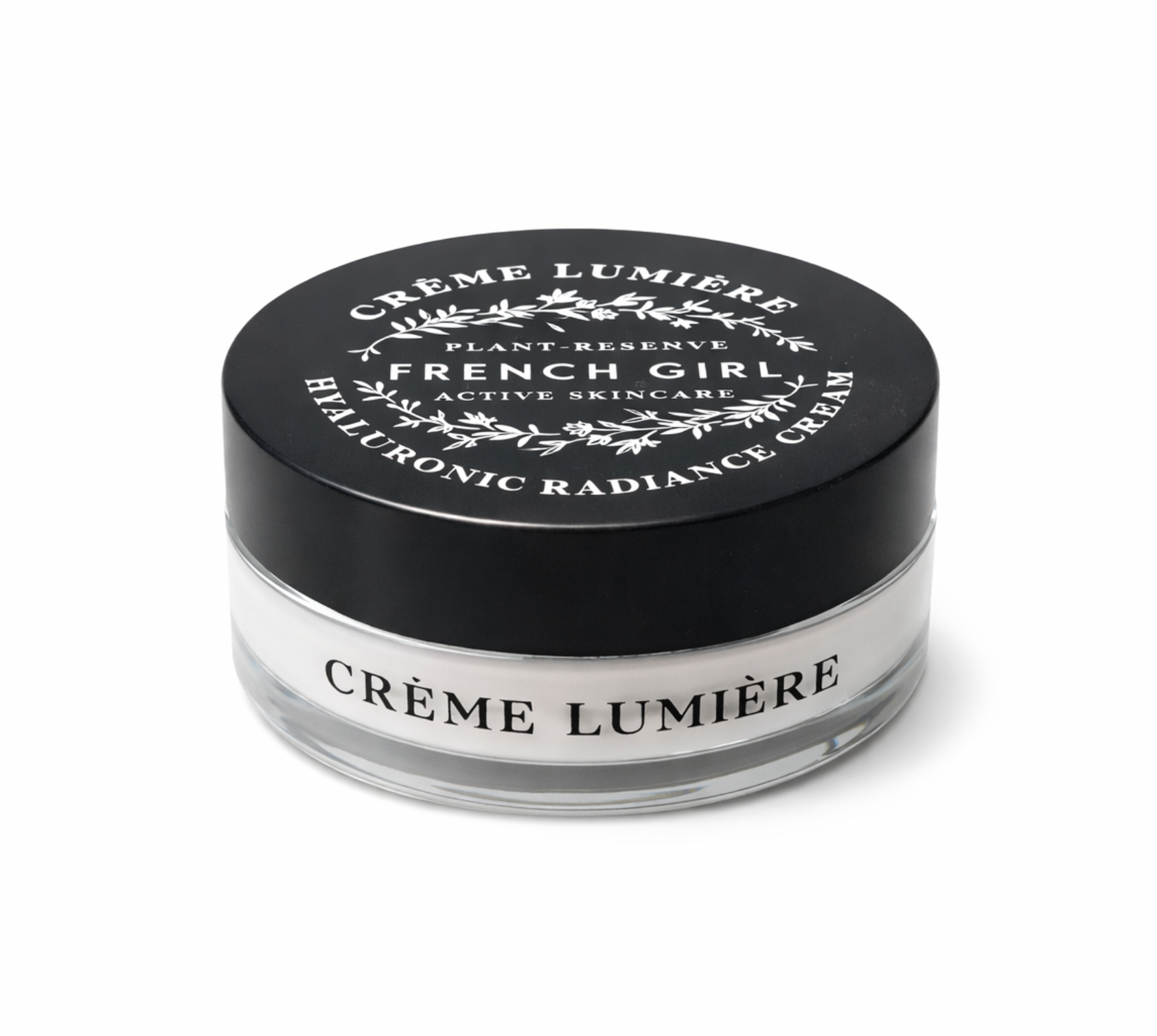 French Girl Crème Lumière Hyaluronic Radiance Cream closed glass jar with black lid on white background.