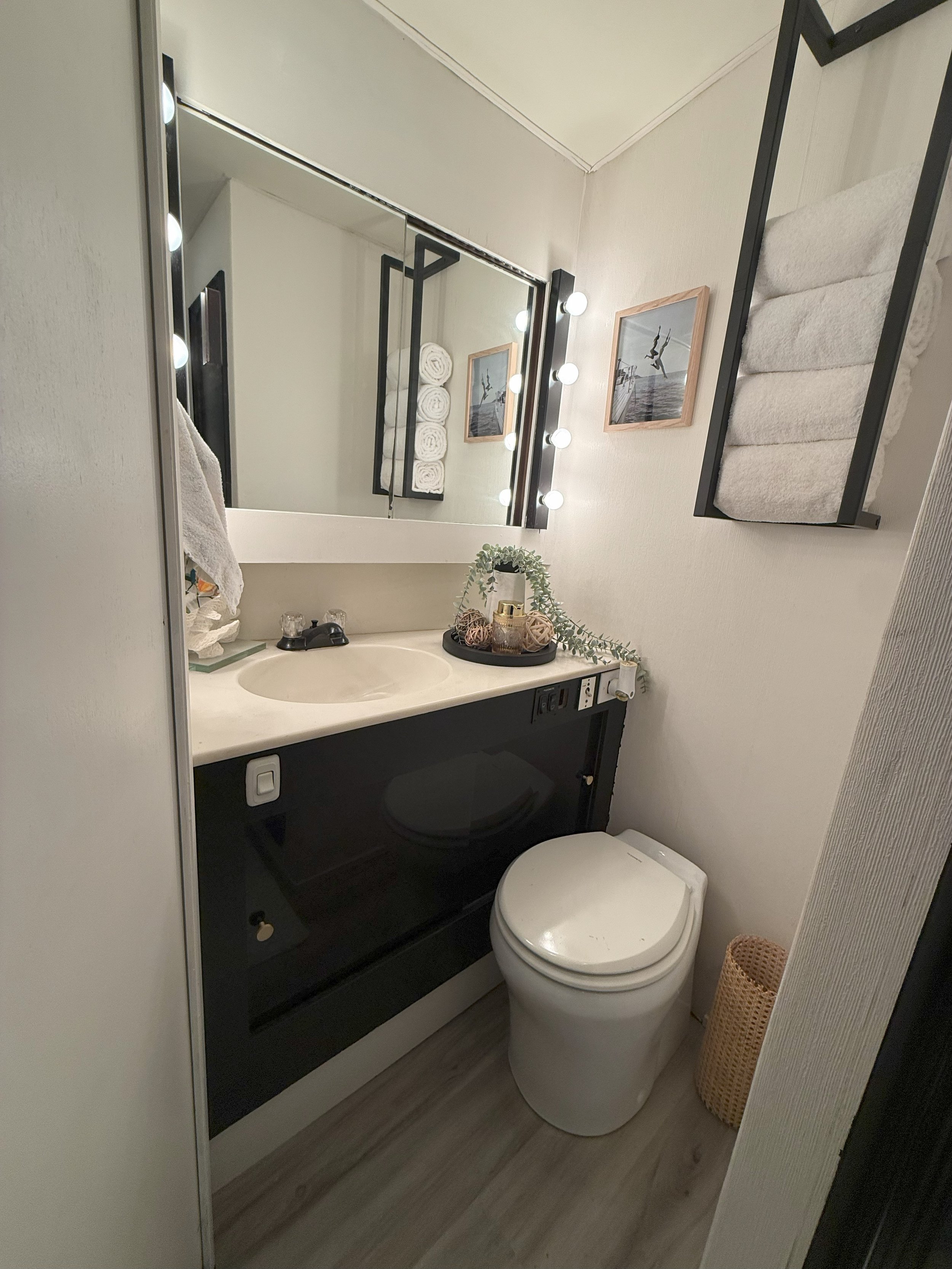 Bathroom 1 equipped with sink, toilet and shower