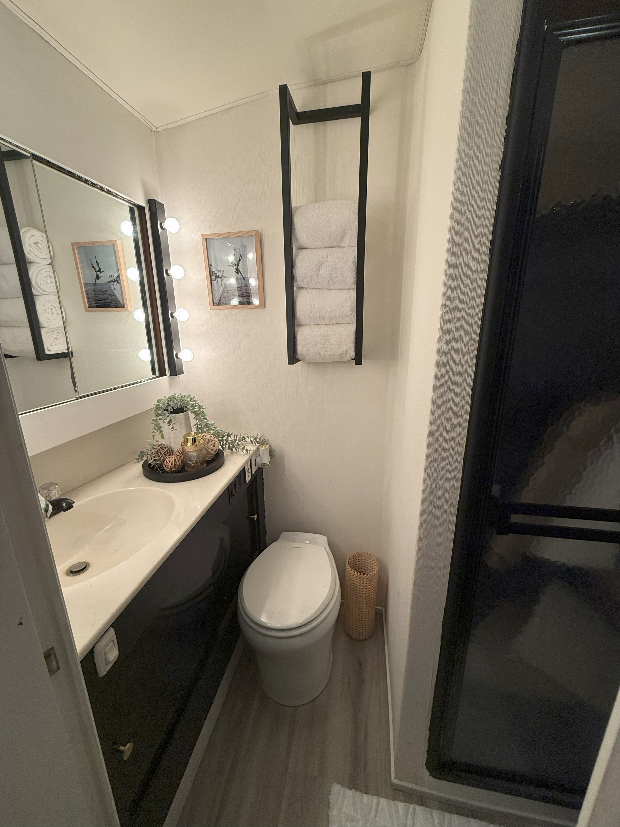 Bathroom 1 equipped with sink, toilet and shower