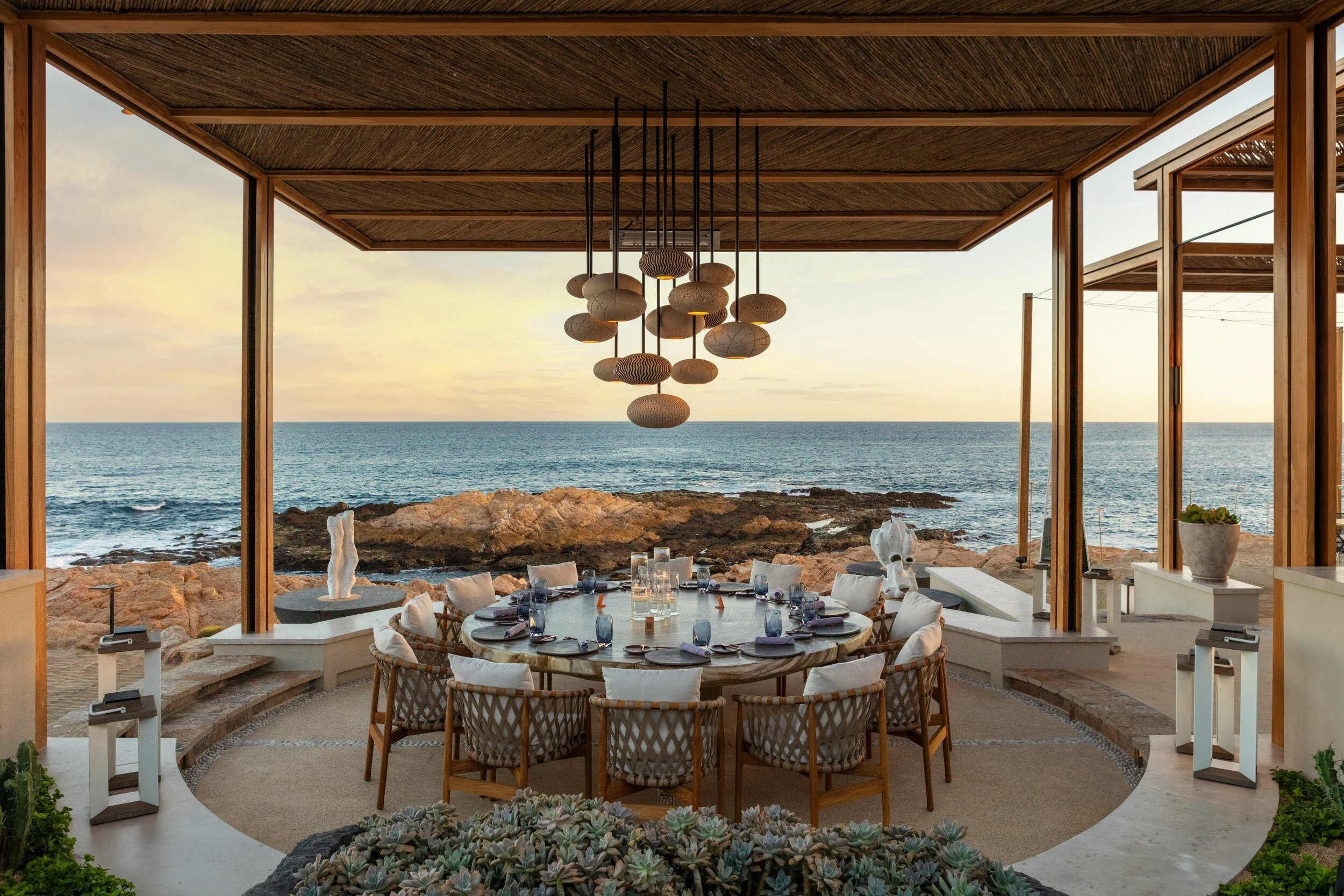 maravilla-los-cabos-oceanfront-dining-terrace-pendant-lights-sunset.jpg