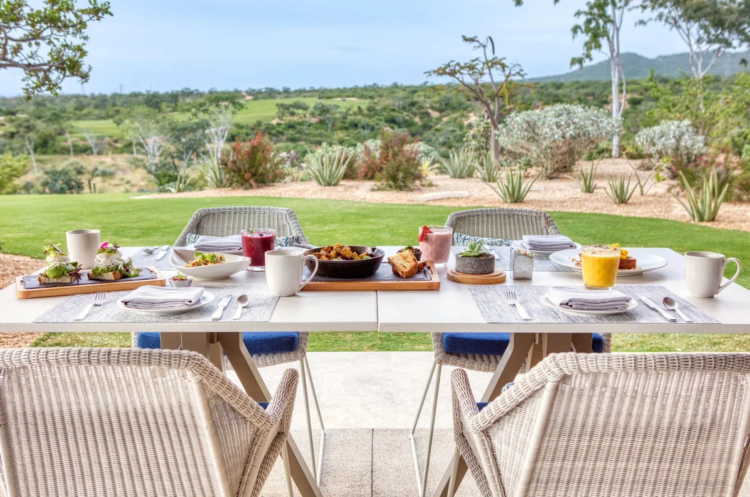 maravilla-los-cabos-outdoor-breakfast-table-lawn-view.jpg