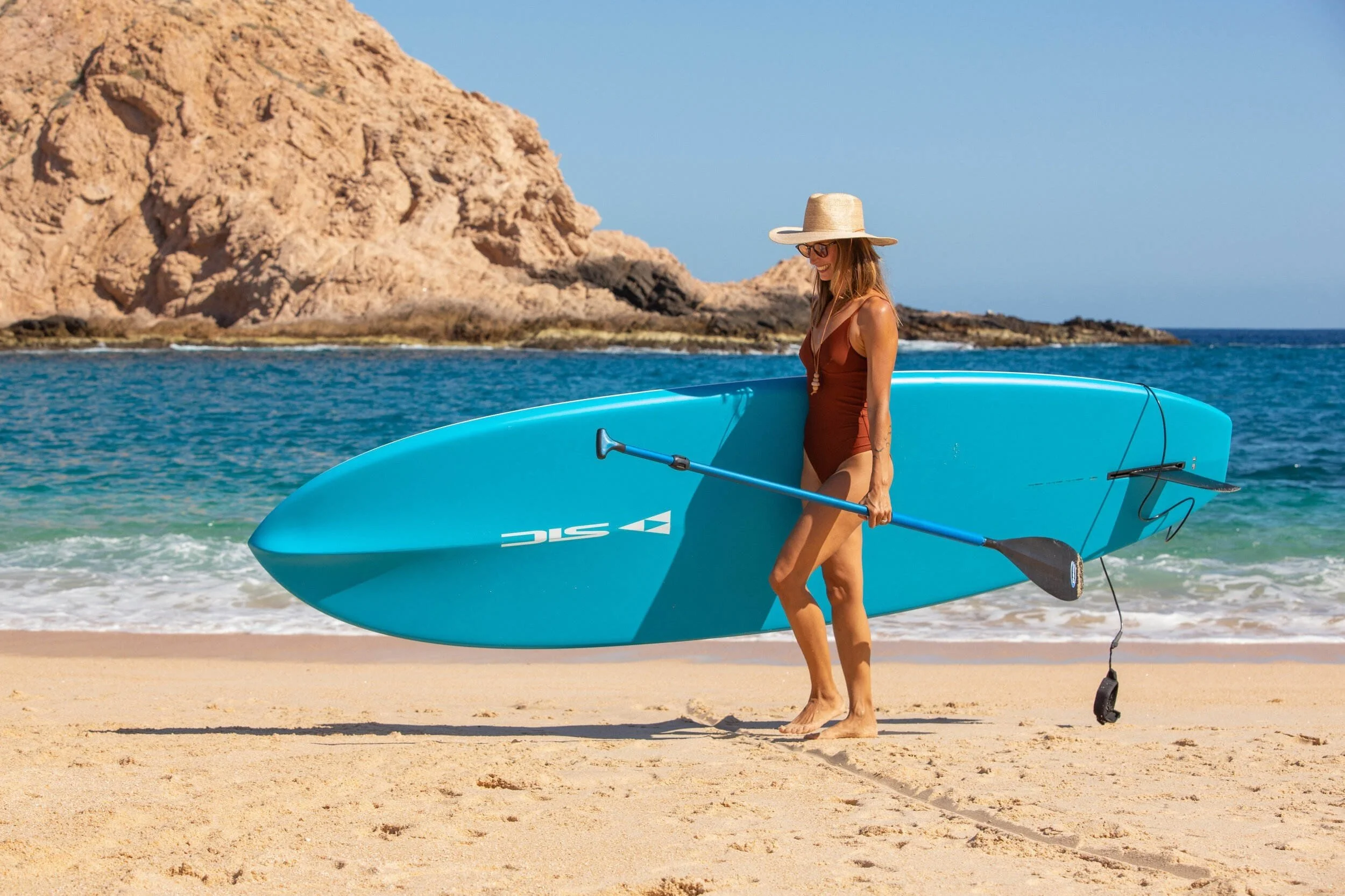 maravilla-los-cabos-woman-paddleboard-beach-turquoise.jpg