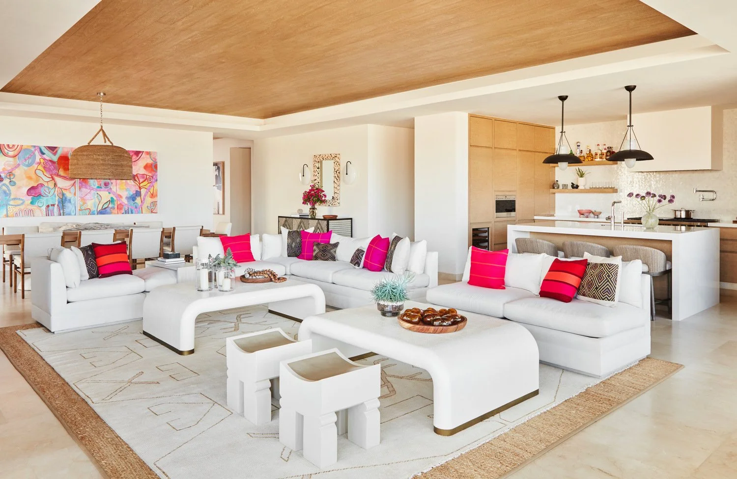ohana-cabo-living-room-white-sectional-colorful-art.jpg