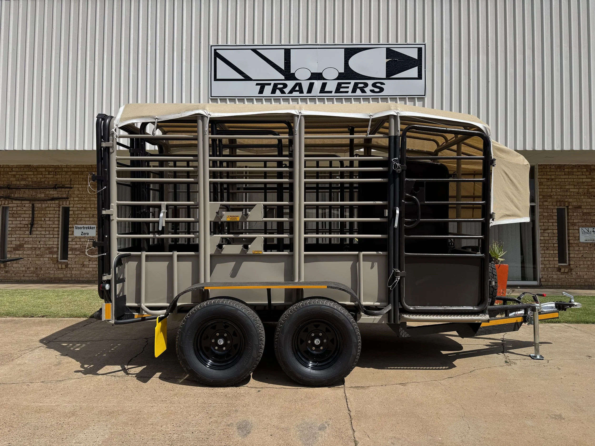 Livestock trailer with beige cover