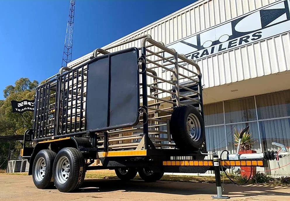 Livestock trailer with metal bars and spare tire