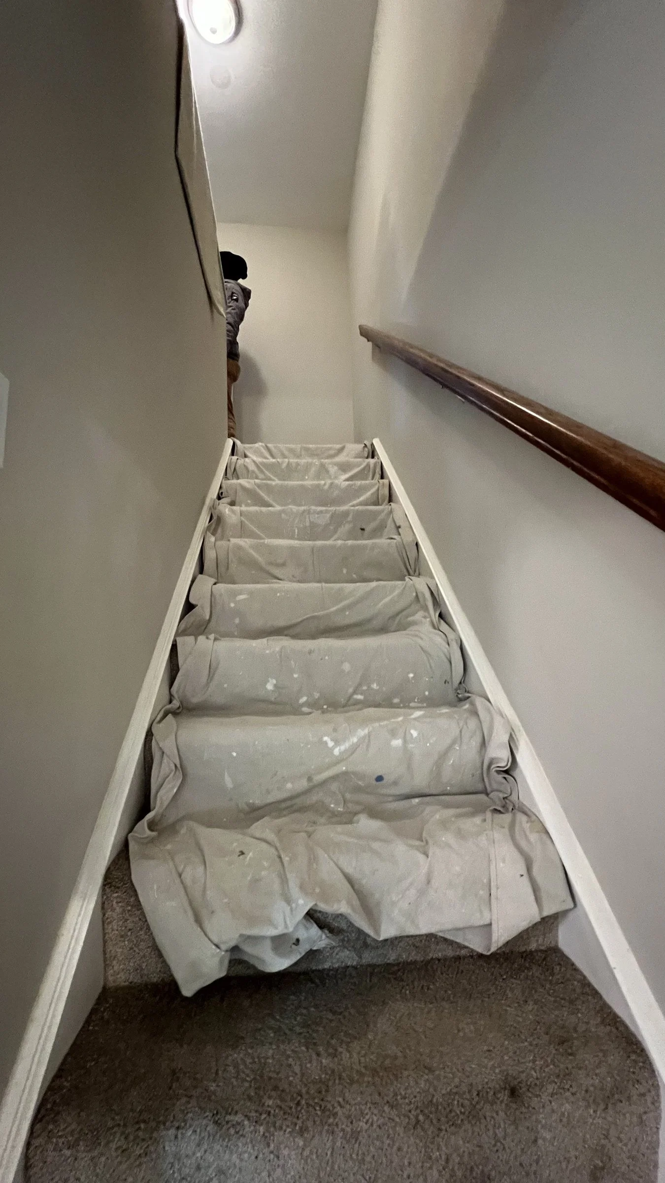 Stairway and floors protected during a multi-room interior repaint