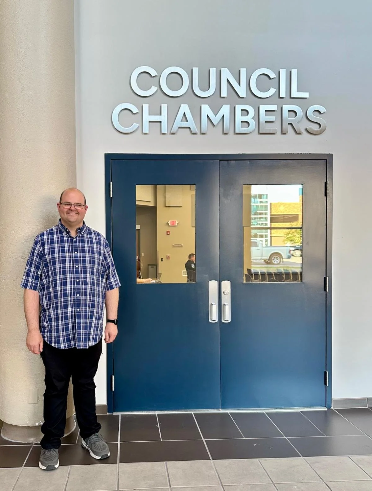 Nate Clark of SAM SW poses for a photo after sharing his transportation story with his city council.