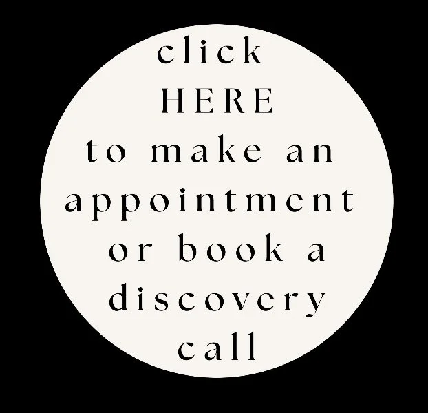 Text in a white circle on a black background that reads: "click HERE to make an appointment or book a discovery call".