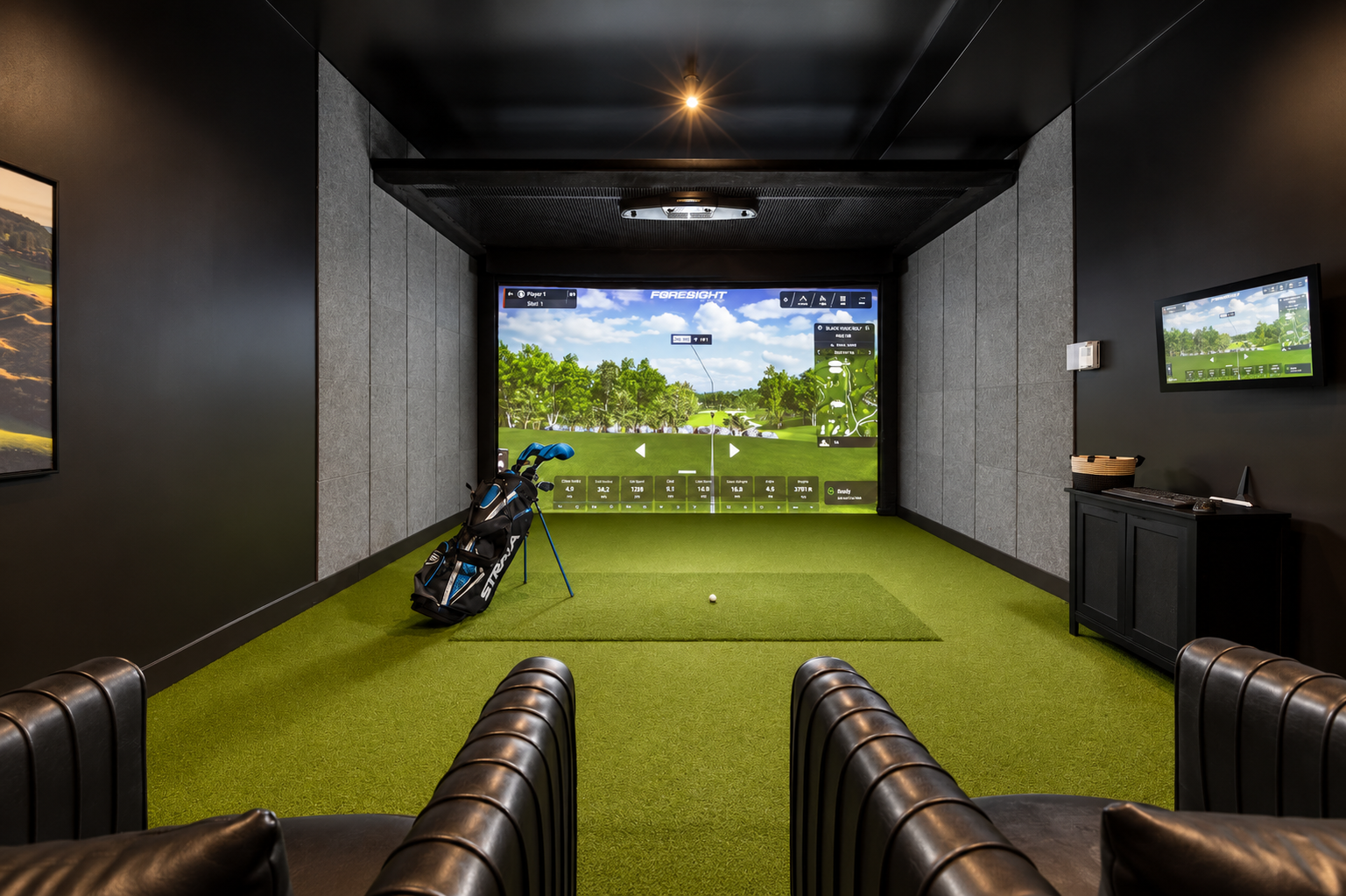 Luxury Indoor Golf Simulator Lounge.png