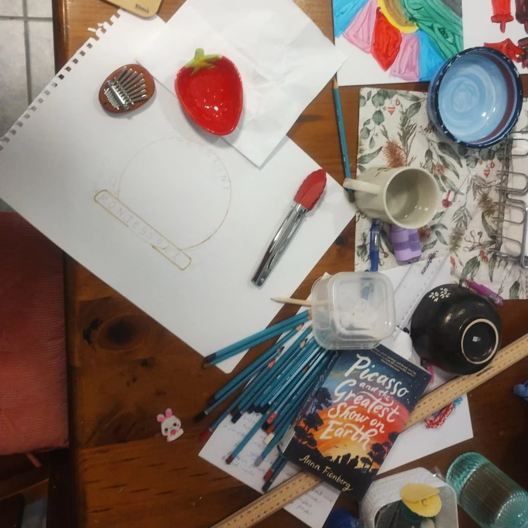 Creating the logo for my parent and toddler program. My daughter is helping me with the drawings. Whereas I overthink everything, she just draws. Effortlessly and with joy.