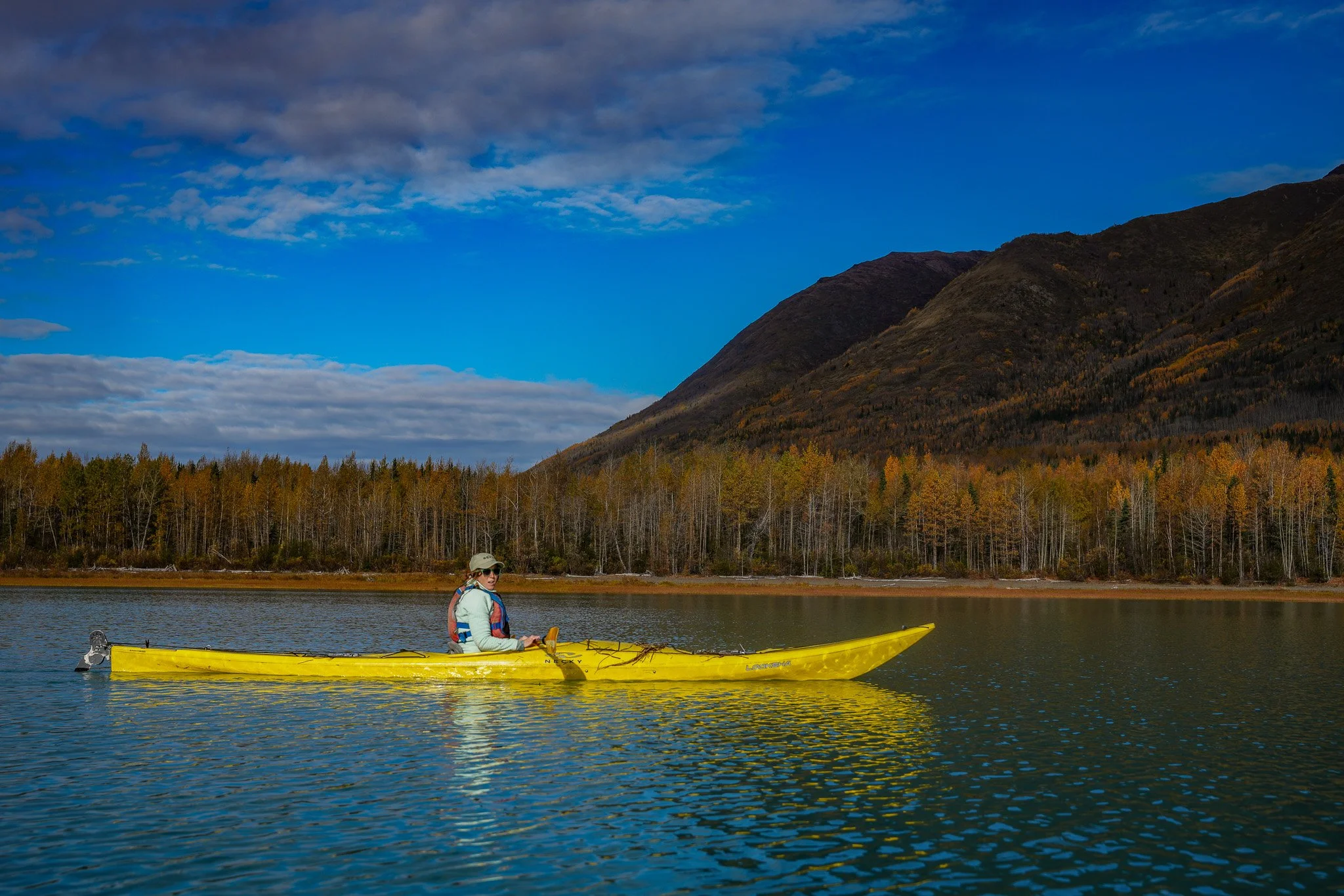 Kayaker on Eklutna Lake in Chugach State Park, Blod Peak in the background