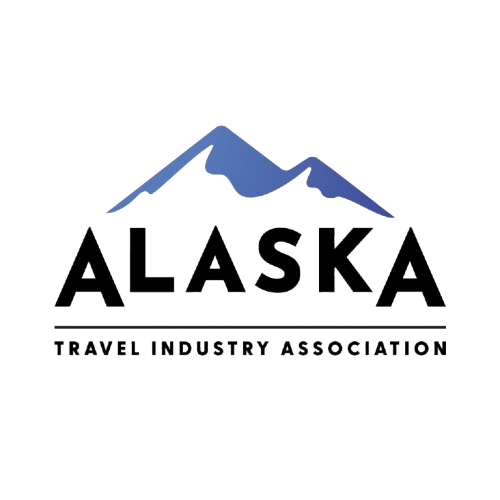 Logo of the Alaska Travel Industry Association featuring stylized mountains in blue.