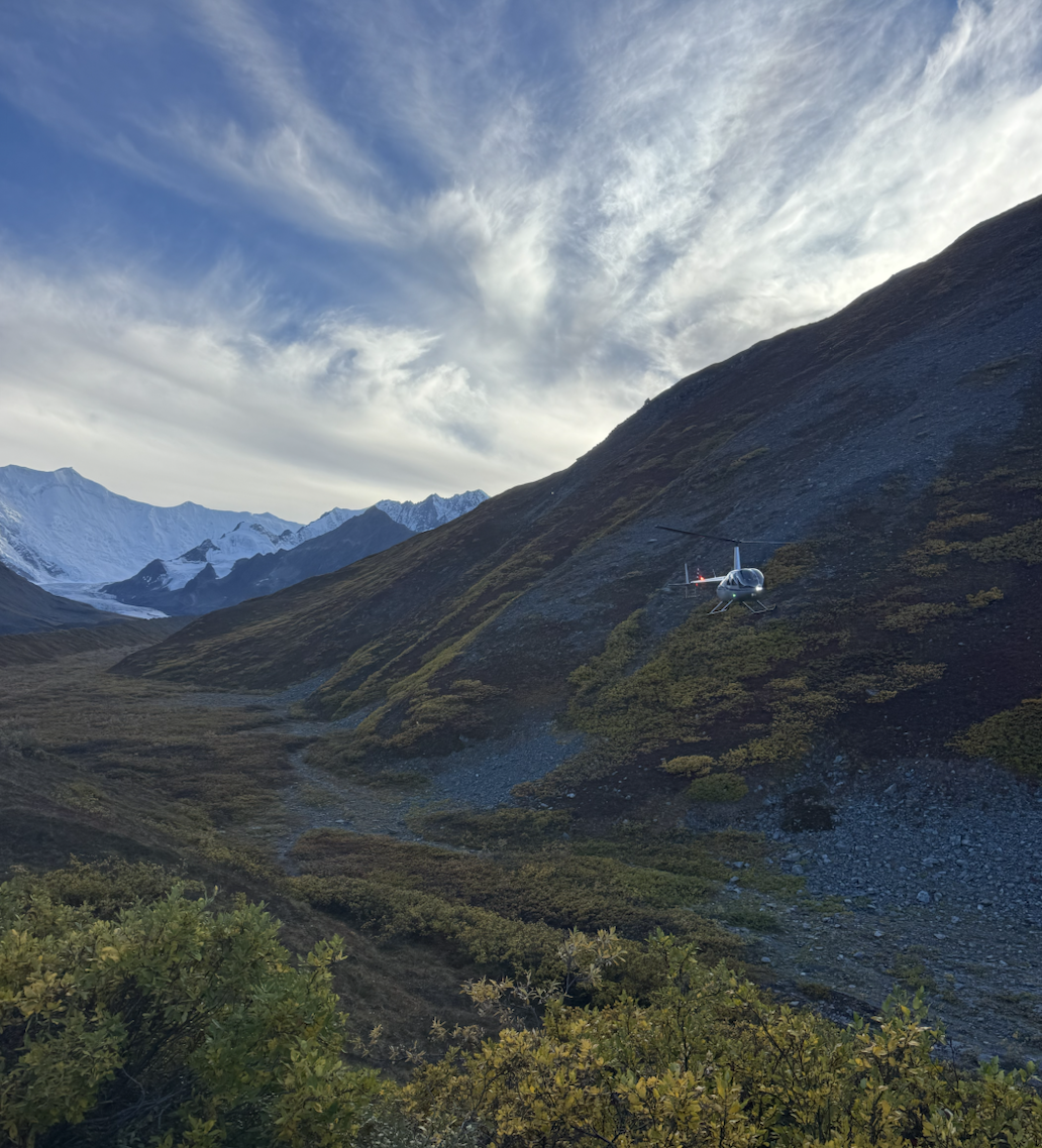 Helicopter landing in the Chugach Mountains