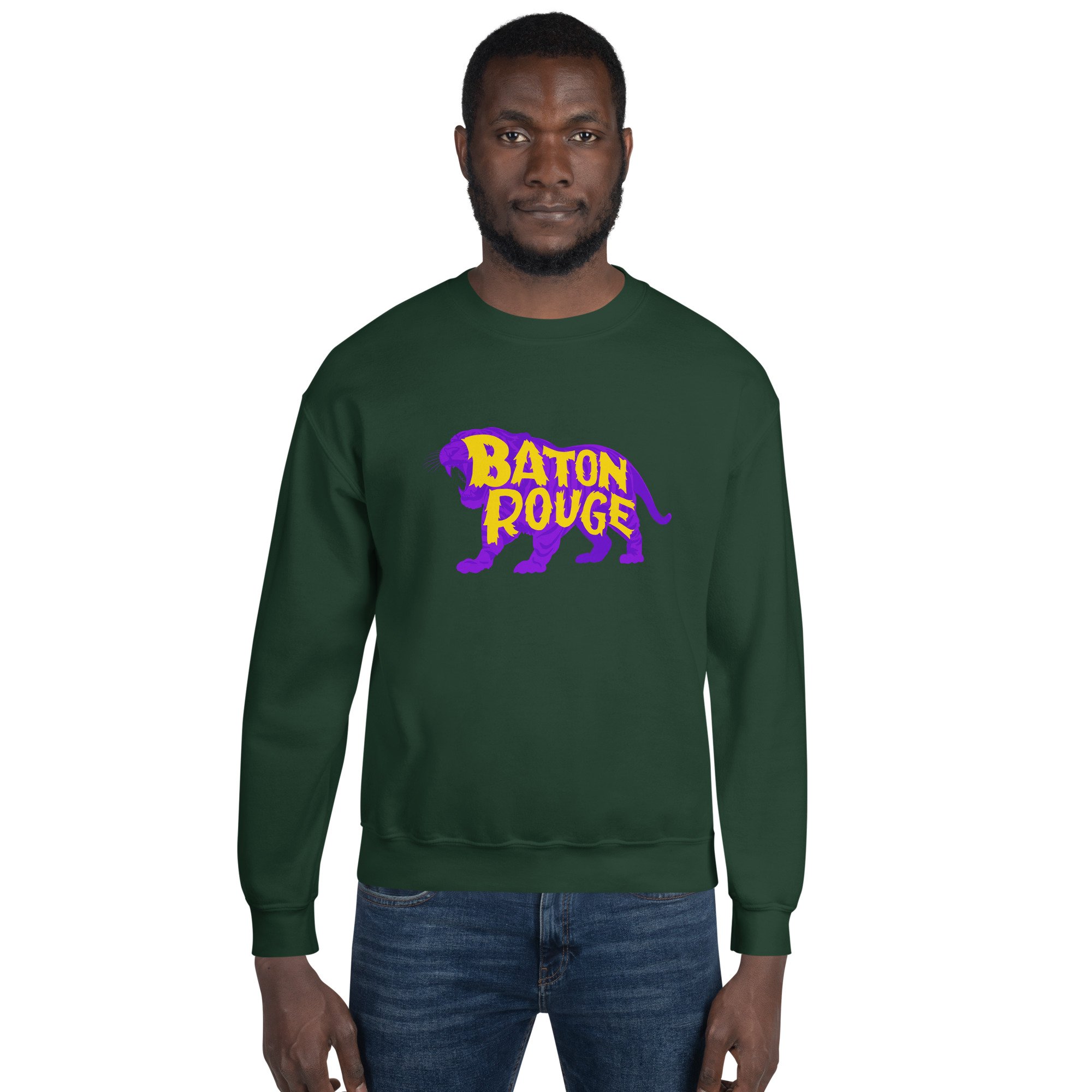 Man wearing green crewneck sweatshirt with Baton Rouge tiger graphic centered on chest, blending comfort and campus tradition.