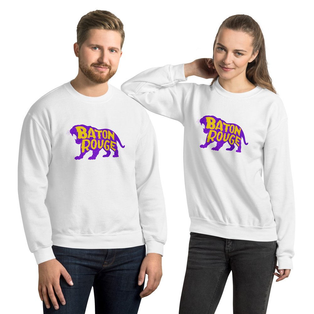 Man and woman wearing white crewneck sweatshirts with Baton Rouge tiger graphic centered on chest, blending comfort and campus tradition.