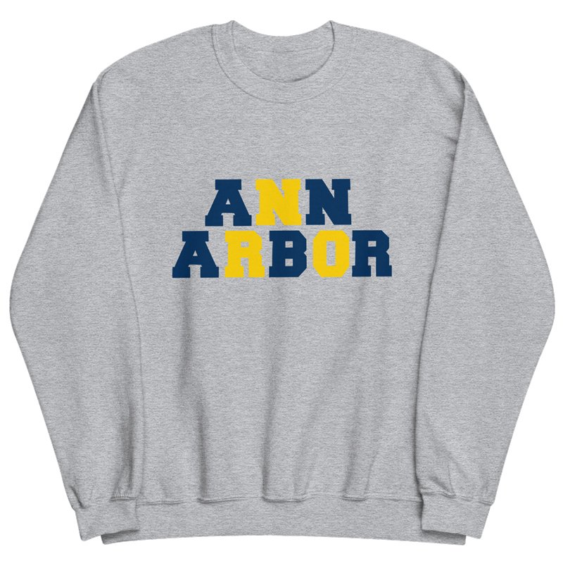 Heathery grey crewneck sweatshirt in heather grey with Ann Arbor blue and maize block lettering design.