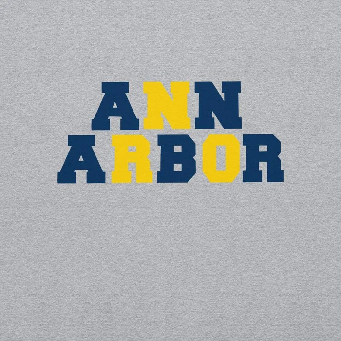 Closeup of Ann Arbor blue and maize block lettering design.