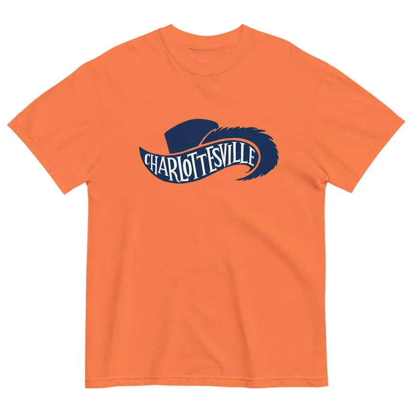 Charlottesville Virginia garment-dyed t-shirt in burnt orange with navy Cavalier hat and orange feathered plume design, original Kittonix design for UVA fans