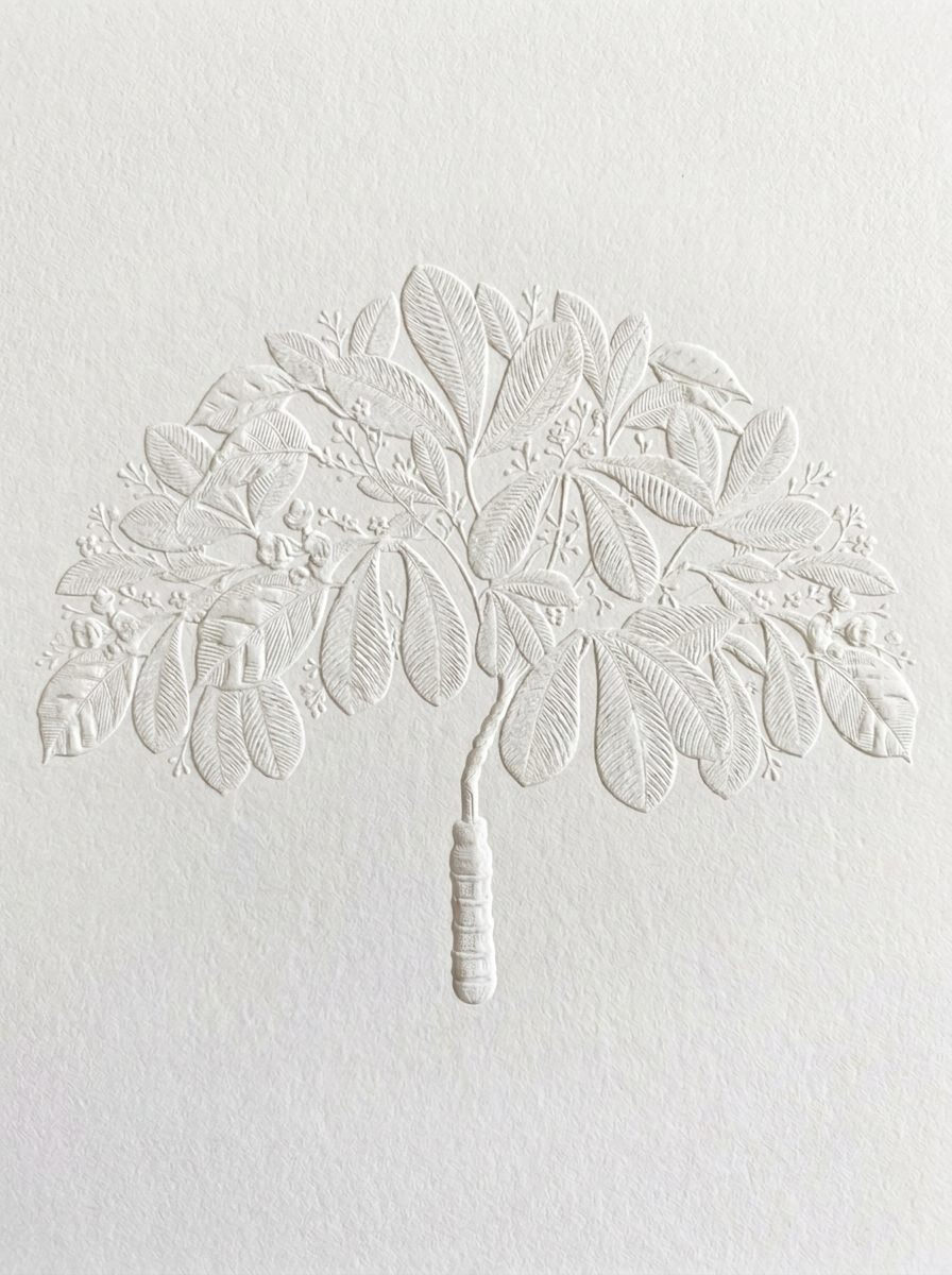 White embossed art of a plant with leaves, branches, and a root or stem at the bottom on a textured white background.