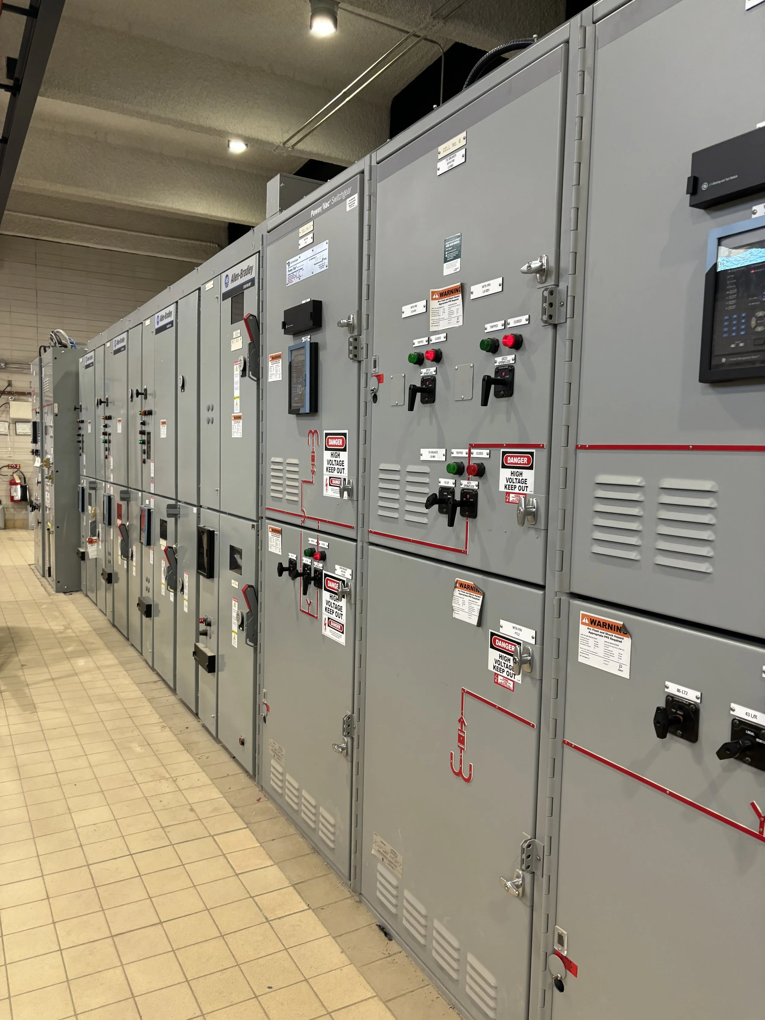Electrical switchgear and control panels in an industrial setting.