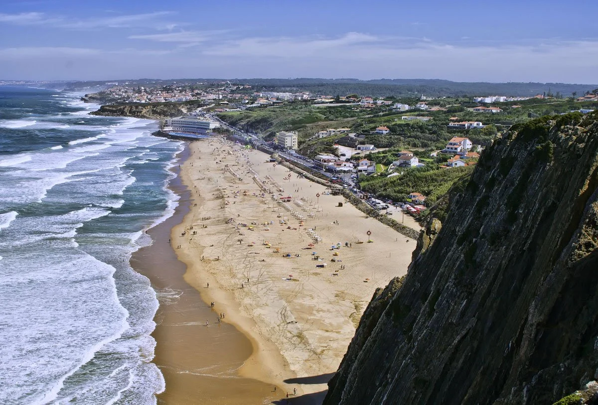 praia-grande-sintra-wide-sandy-beach-surf-lisbon-day-trip.webp