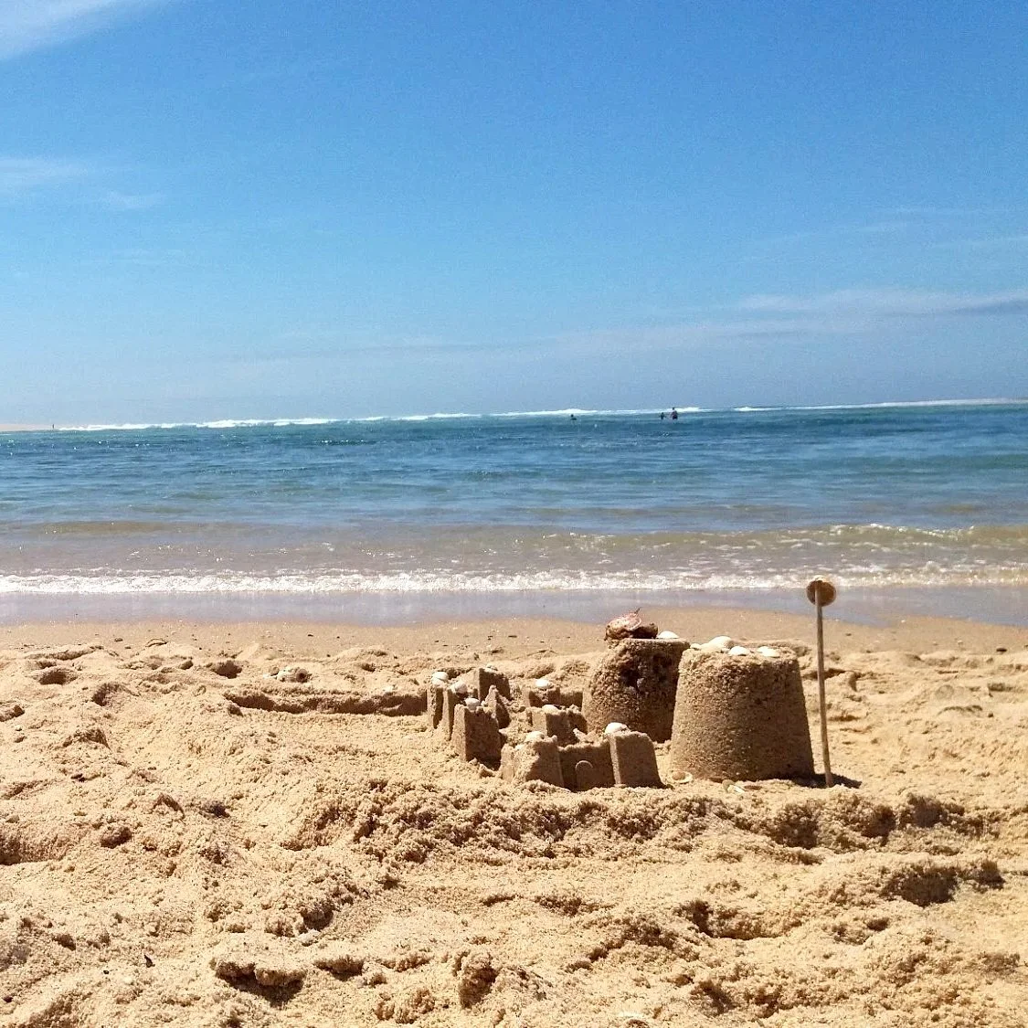 lagoa-de-obidos-sandcastle-family-lagoon-beach-calm-water-portugal.webp