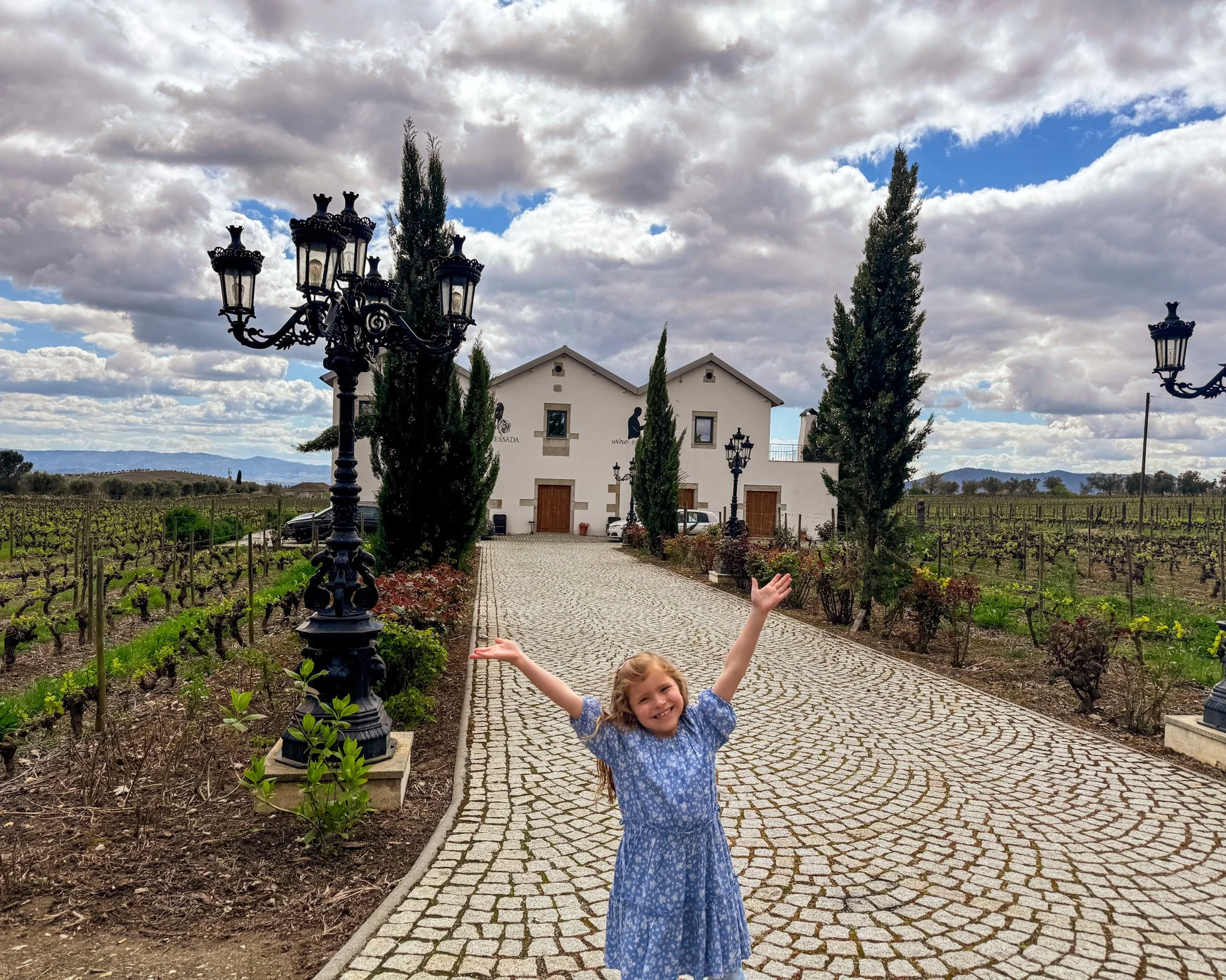 child-exploring-douro-valley-winery-portugal.jpg
