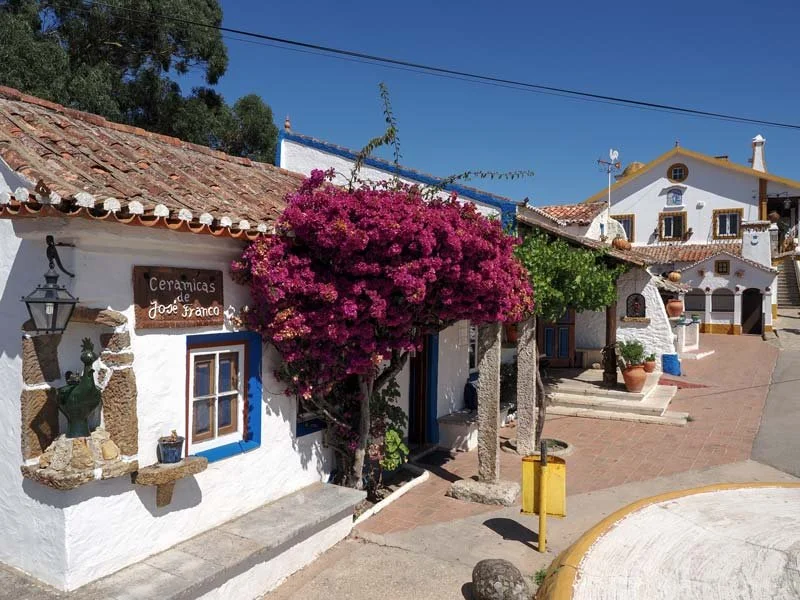 Aldeia Típica José Franco, an open-air museum dedicated to preserving the rich traditions and heritage of the Mafra region, offering visitors a unique glimpse into rural life and historical craftsmanship.