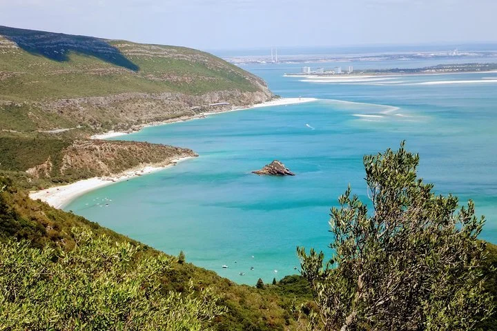 A viewpoint overlooking the emerald sea on Lisbon's South Sights & Wine Tasting Tour in the Arrábida Natural Park