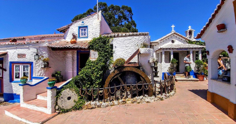 Picturesque Portuguese villages with cobblestone streets, vibrant colors, and time-honored traditions that showcase Portugal's rich heritage and cultural charm.