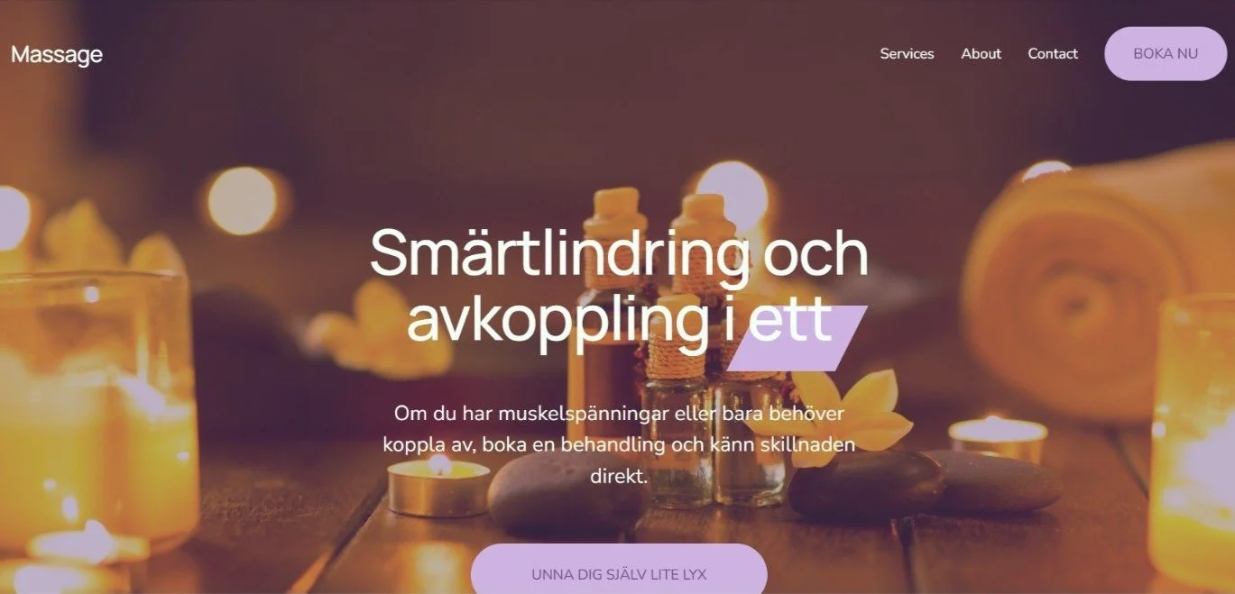 Bild av ett massage- och sparum med ljuslyktor, oljebehållare och stenar för massage.