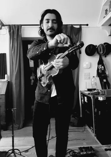 GARO NAHOULAKIAN   Composer, producer and musician. Garo’s media career began with “The Mighty Boosh Journey Of The Childmen” and spans comedy, scripted drama and documentary.  He has won awards for his TV work (MAS, Epica & PMA awards). He als