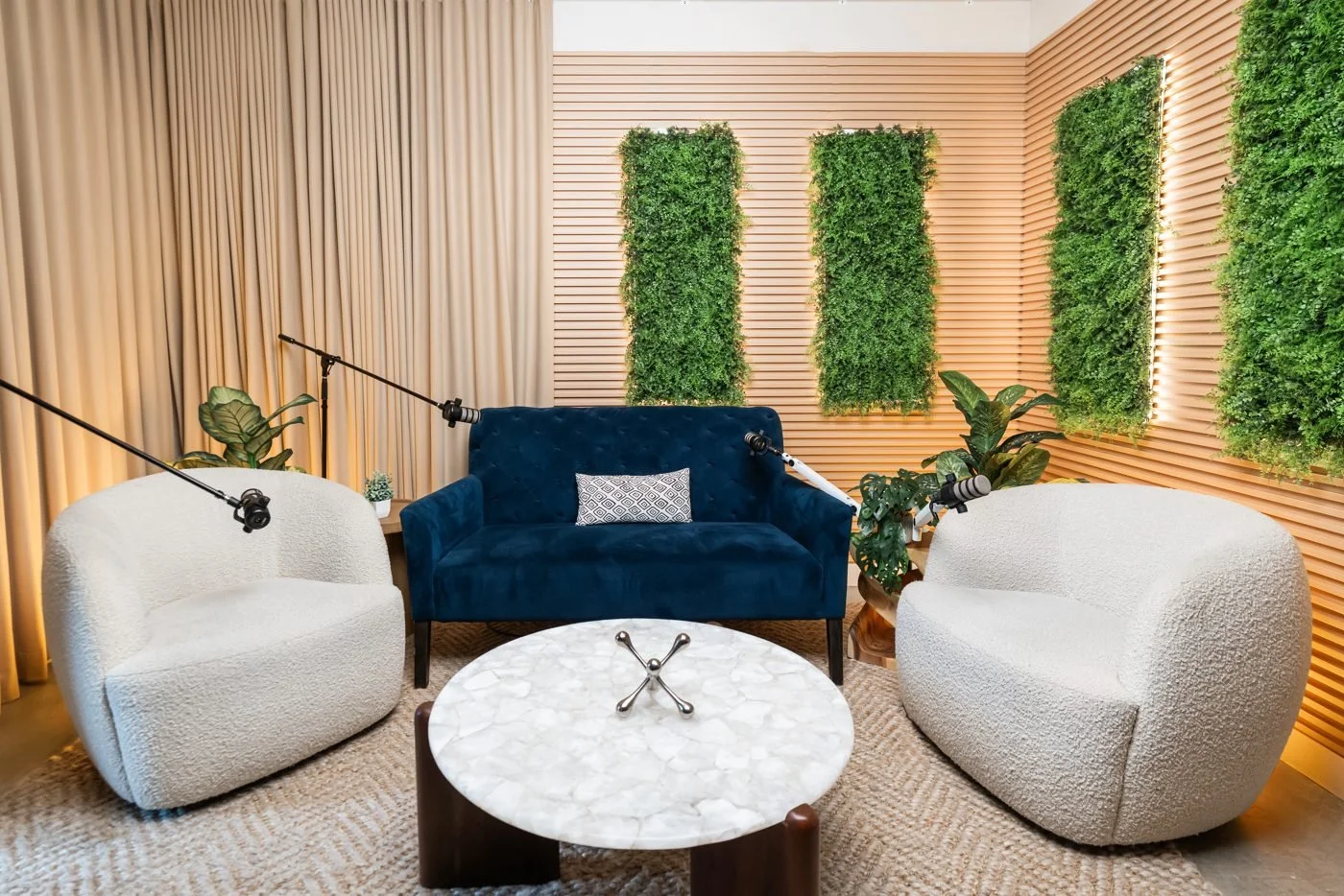 Four-person conversation setup with a sofa and two chairs.