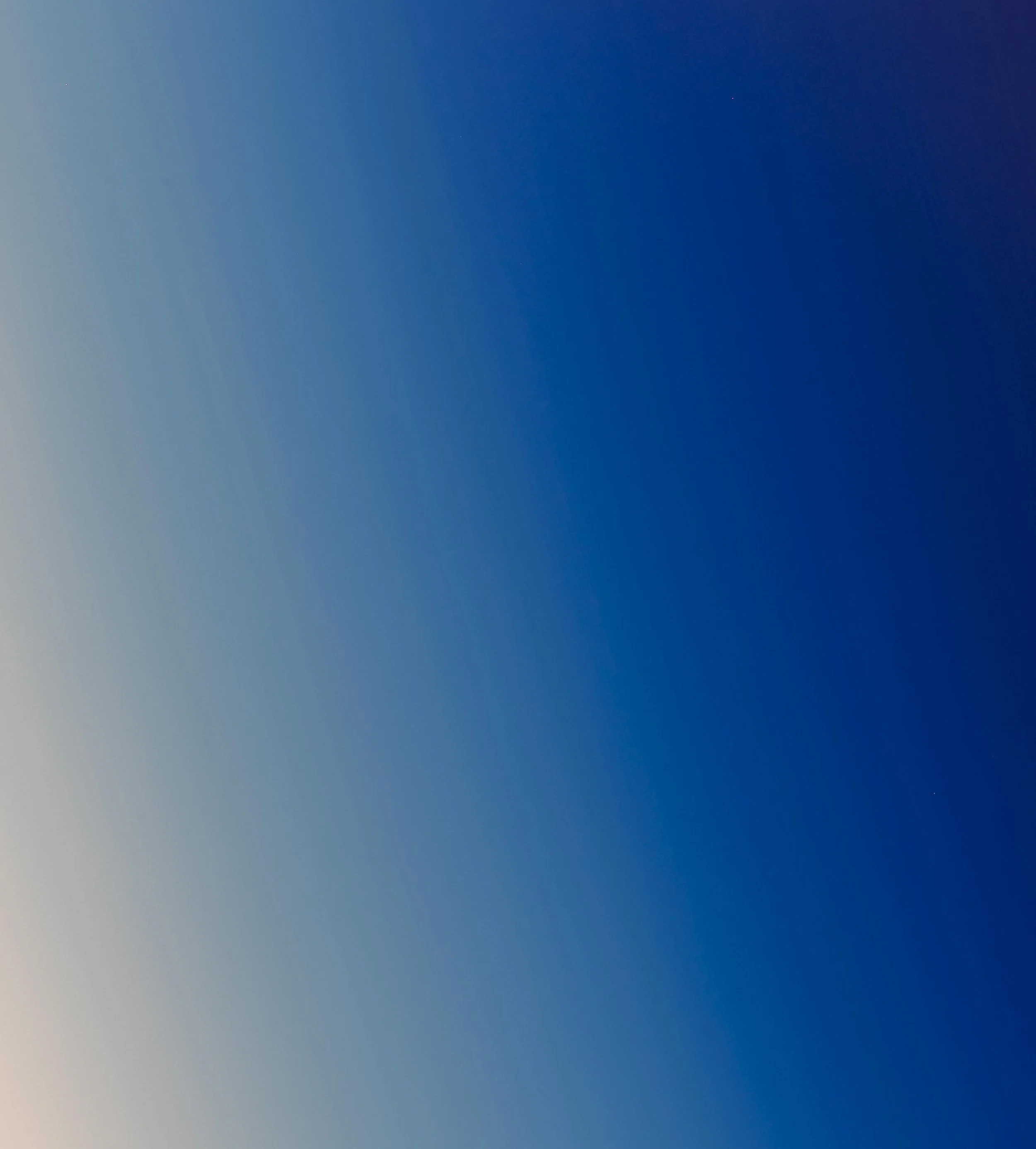 A clear blue sky with a faint star visible near the top left corner.